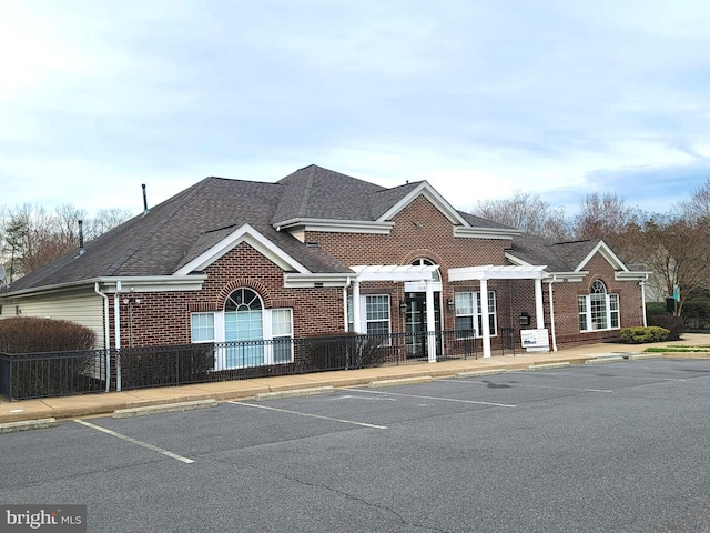 15200 Spotted Turtle Ct, Woodbridge, VA 22193 - view of building exterior with uncovered parking and fence