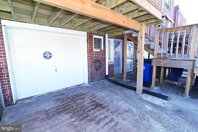 exterior space featuring driveway and a garage