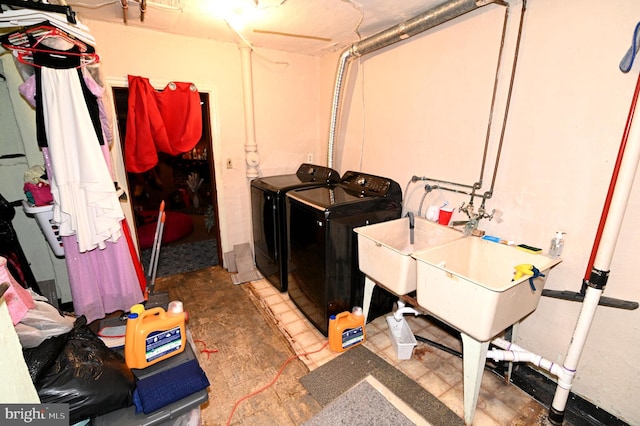 laundry room featuring washer and dryer and laundry area