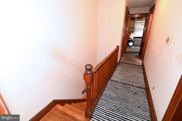 staircase with baseboards