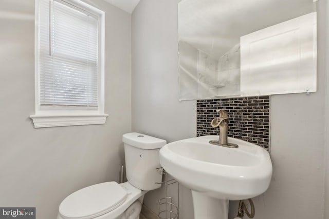 bathroom with a sink and toilet