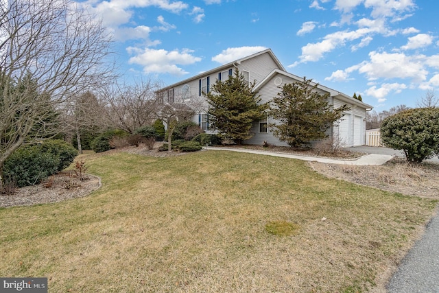 view of property exterior with a yard, a garage, and concrete driveway