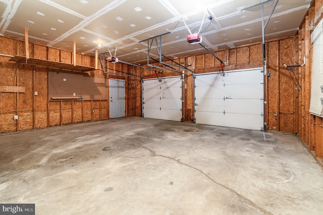 garage featuring a garage door opener