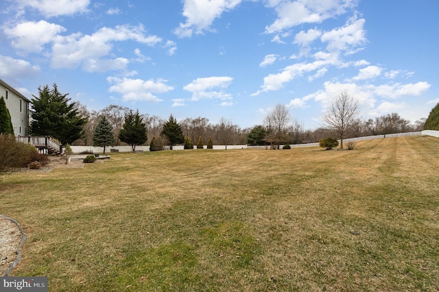 view of yard with a rural view