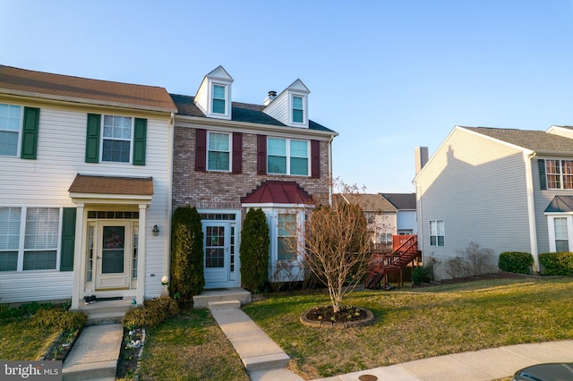 view of property with a front yard