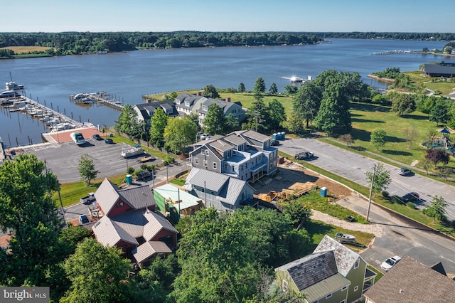 aerial view with a residential view and a water view