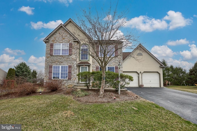 view of front of property featuring a front lawn, aphalt driveway, stucco siding, stone siding, and an attached garage