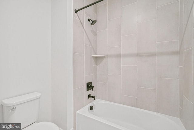 bathroom with shower / bath combination and toilet