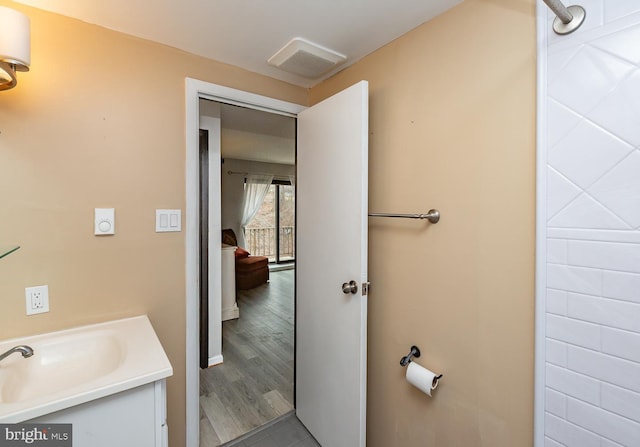 bathroom with visible vents and vanity