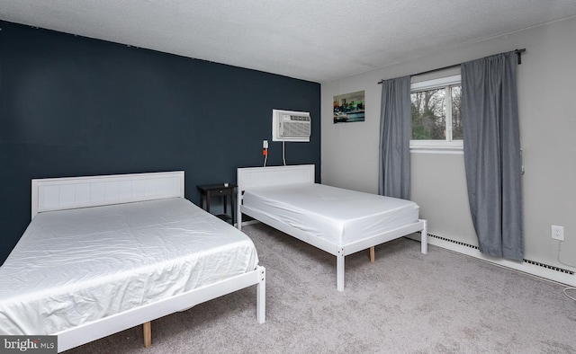 bedroom featuring carpet flooring, a textured ceiling, baseboard heating, and a wall mounted AC