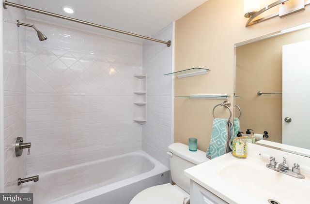 bathroom with vanity, toilet, and tub / shower combination