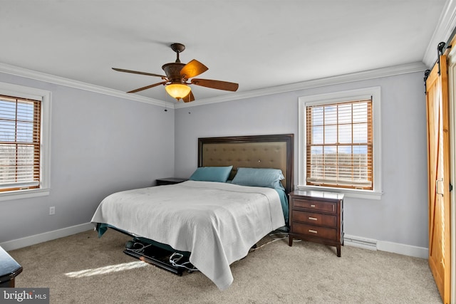 bedroom featuring a barn door, light carpet, and ornamental molding