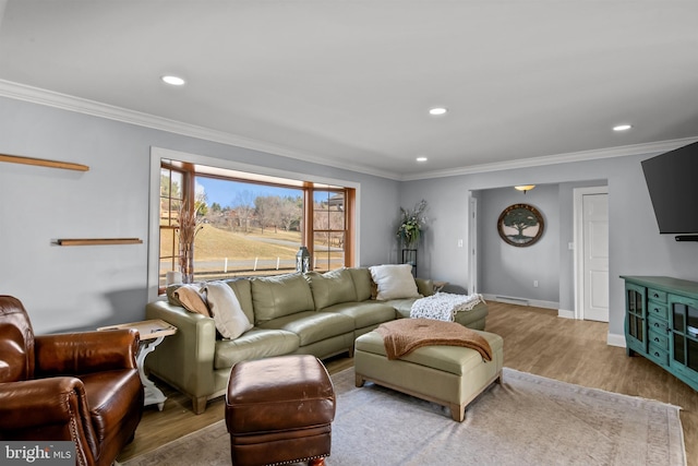 living area with recessed lighting, crown molding, and wood finished floors