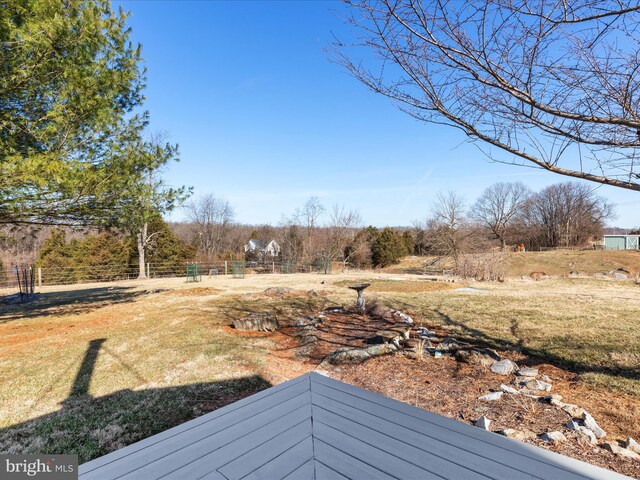 view of yard with fence