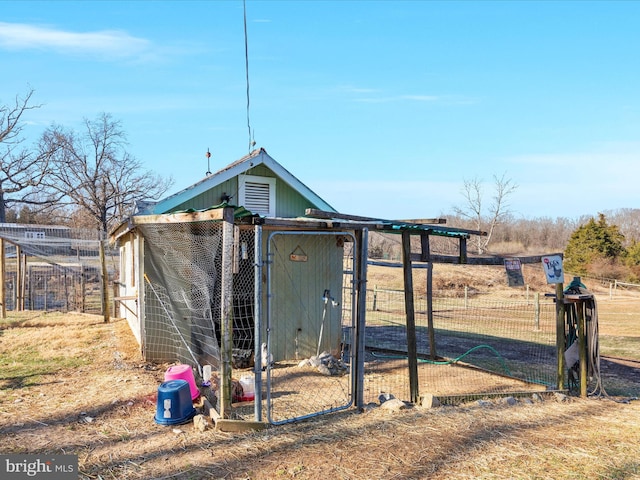 view of poultry coop with fence