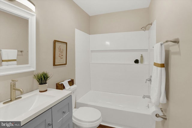 full bathroom featuring vanity, toilet, and shower / tub combination