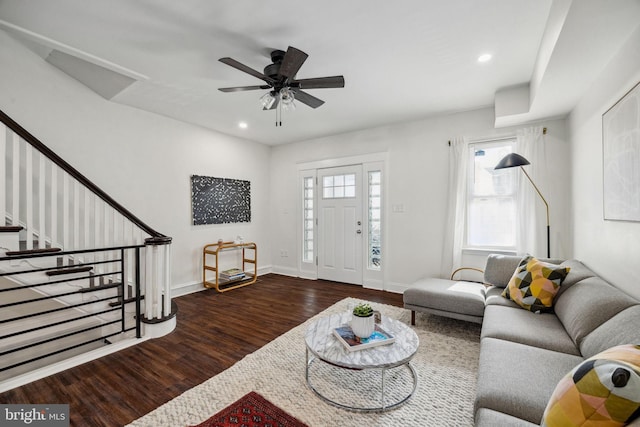 living area featuring wood finished floors, recessed lighting, stairway, baseboards, and ceiling fan