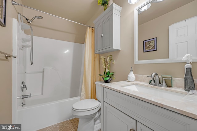 bathroom featuring vanity, toilet, and shower / tub combo with curtain