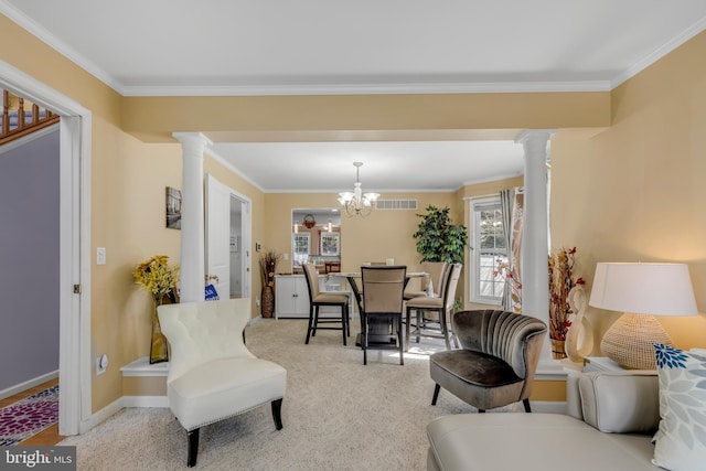 carpeted living area featuring crown molding, decorative columns, and visible vents