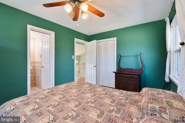 bedroom featuring a closet and ceiling fan