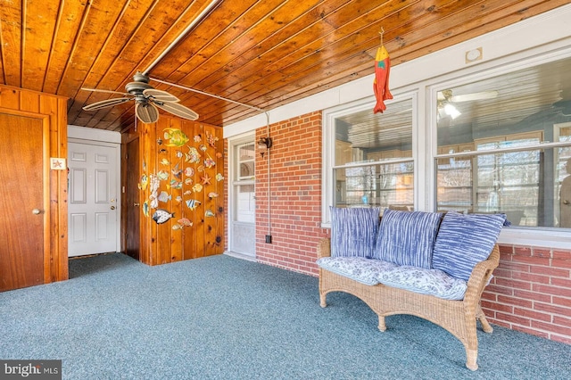 interior space featuring a ceiling fan