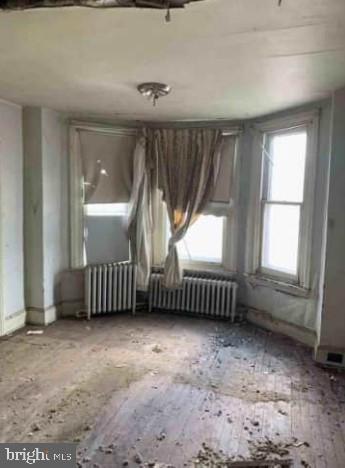 spare room with radiator