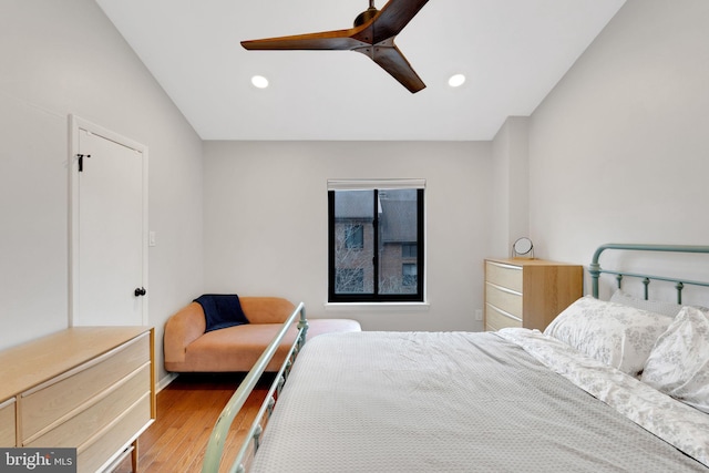 bedroom featuring recessed lighting, wood finished floors, and ceiling fan