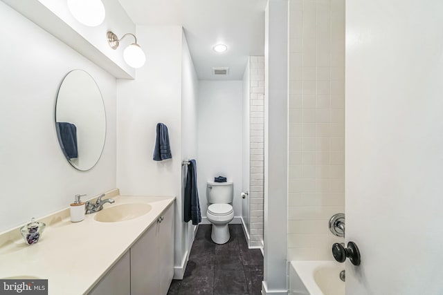 bathroom featuring vanity, baseboards, visible vents, shower / tub combination, and toilet