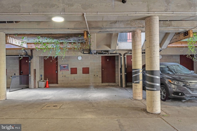 basement featuring concrete block wall