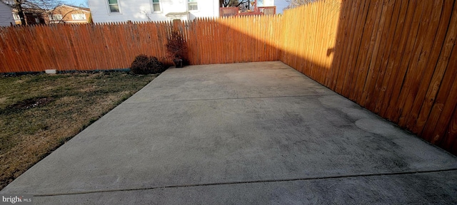 view of patio / terrace featuring fence