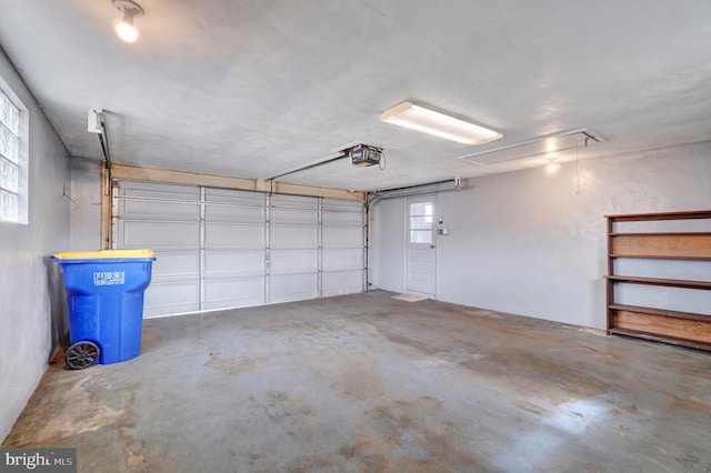 garage featuring a garage door opener