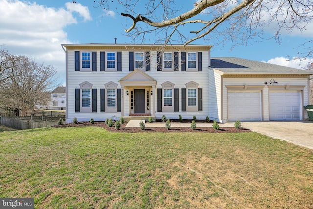 colonial home with driveway, a front yard, an attached garage, and fence