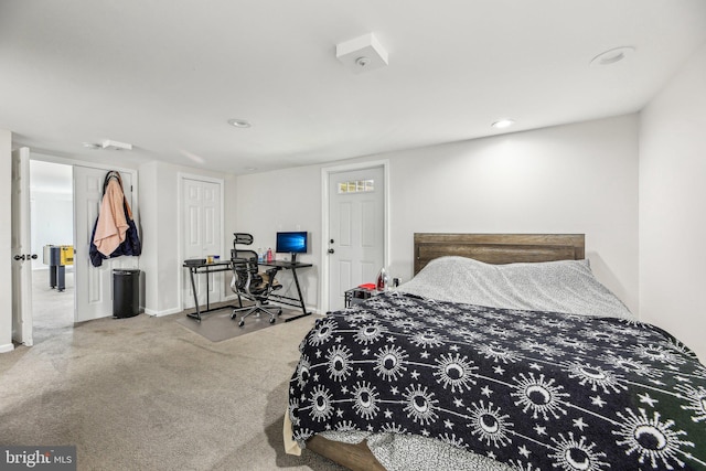 bedroom with recessed lighting, baseboards, and carpet floors