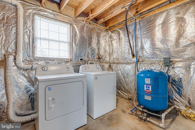 clothes washing area featuring washing machine and dryer