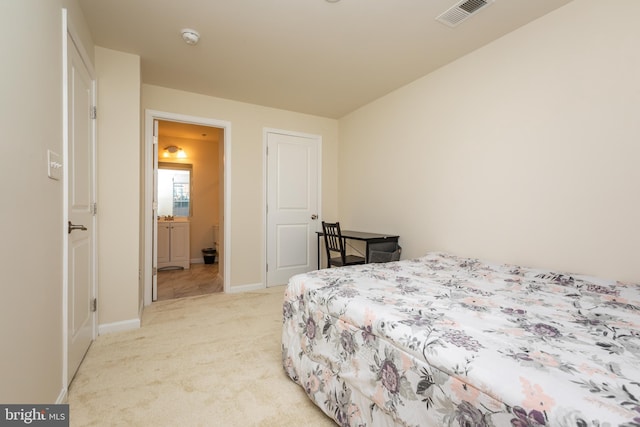 bedroom with baseboards, visible vents, and light carpet