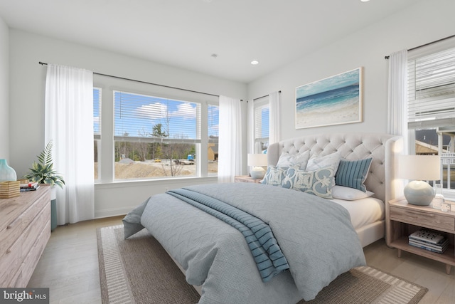 bedroom featuring recessed lighting and light wood finished floors