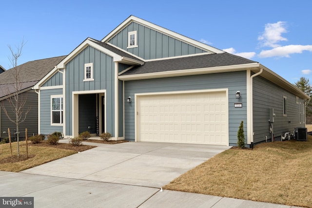 view of front of home featuring central AC unit, board and batten siding, concrete driveway, and an attached garage