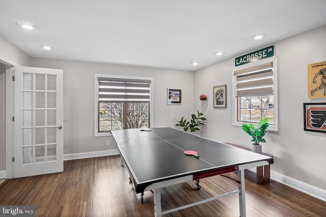 rec room featuring a wealth of natural light, baseboards, recessed lighting, and dark wood-style flooring