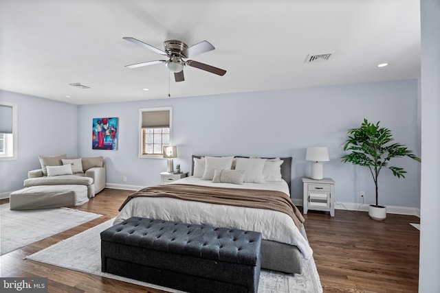 bedroom featuring visible vents, ceiling fan, baseboards, recessed lighting, and wood finished floors