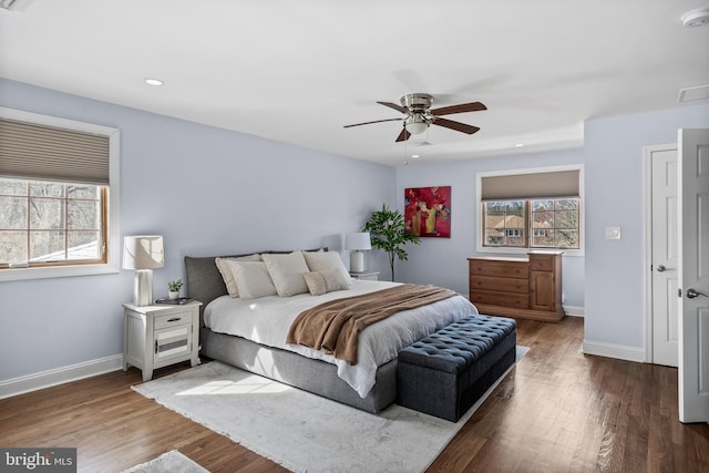 bedroom featuring recessed lighting, baseboards, wood finished floors, and ceiling fan