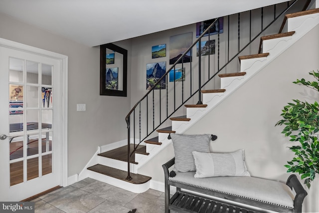 stairway with baseboards