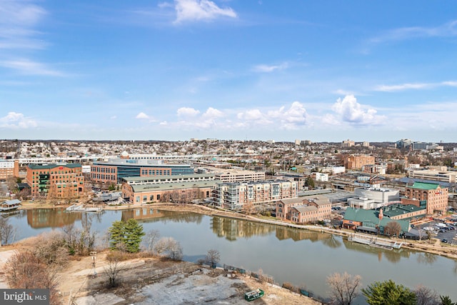 drone / aerial view with a view of city and a water view