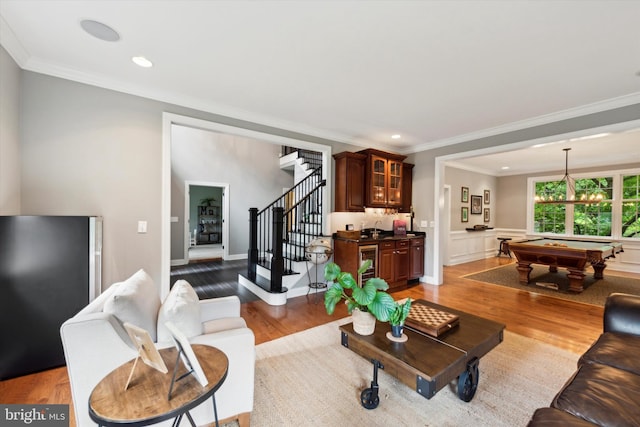 living room featuring stairs, light wood-style floors, recessed lighting, and billiards