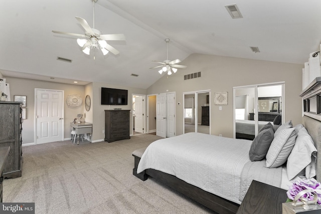 bedroom featuring visible vents, light colored carpet, and high vaulted ceiling
