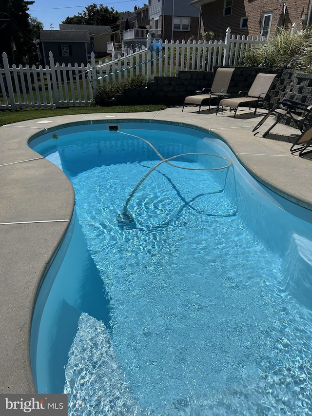 view of pool featuring fence, a patio, and a fenced in pool