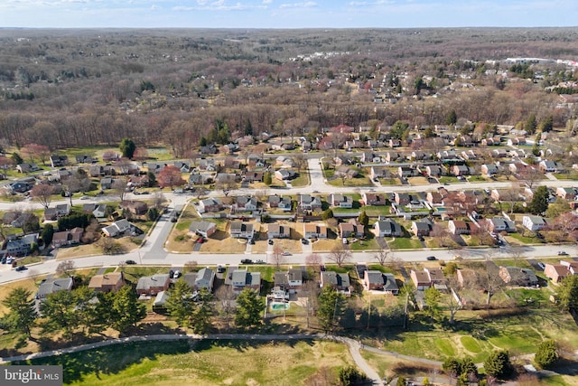 birds eye view of property with a residential view