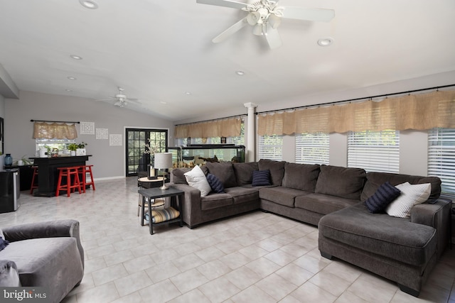 living room with lofted ceiling, light tile patterned flooring, recessed lighting, and ceiling fan