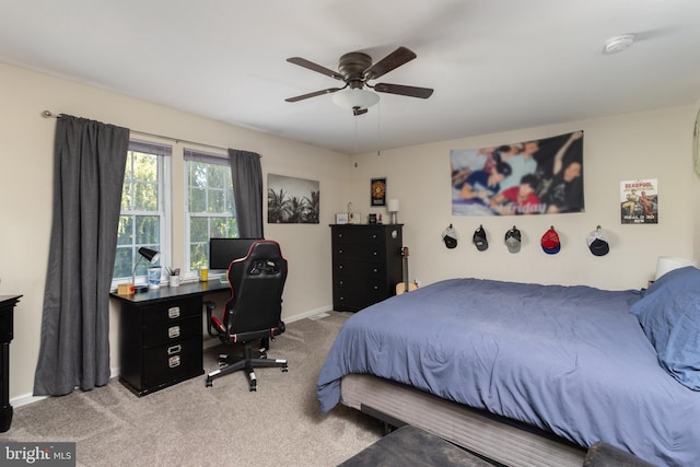bedroom with carpet, baseboards, and ceiling fan