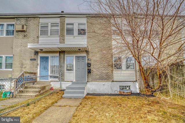 multi unit property featuring brick siding