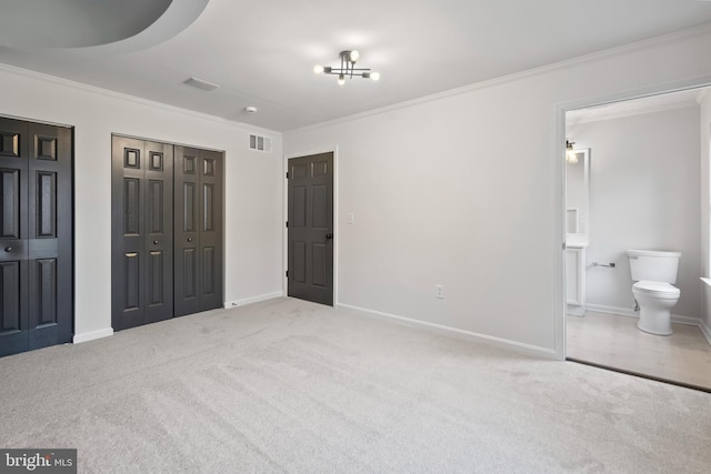 bedroom with crown molding, baseboards, visible vents, and carpet floors